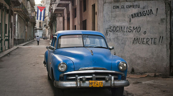 Car by 'socialism or death' grafitto