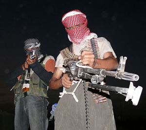 Iraqi_insurgents_with_guns_opt