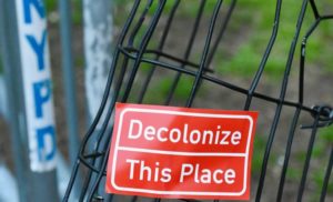 Decolonize this place sign