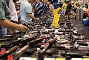 Table full of guns at gun show