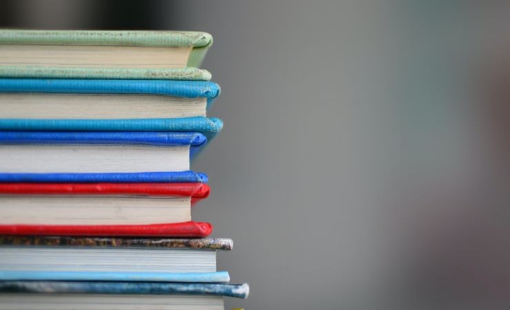 Image: stack of books.