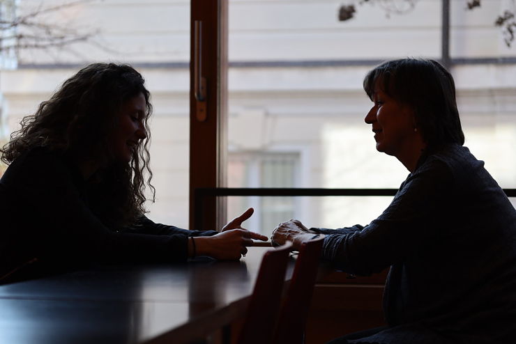 People talking across table