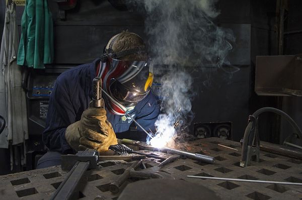 Welder in shop