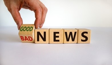 words on blocks show 'bad' side being turned to 'good'