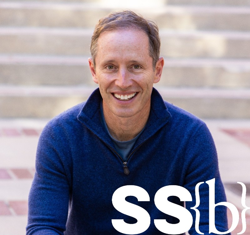 Hal Hershfield in blue pullover against brick background