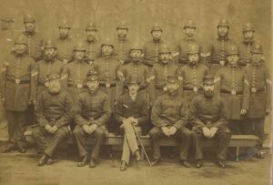 Group photo of 25 British constables in uniform from 1890