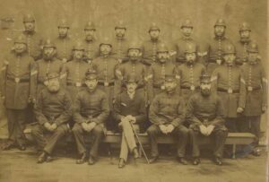 Group photo of 25 British constables in uniform from 1890