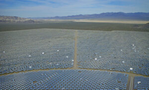 Rows and rows of mirros serving the Ivanpah solar project in the desert