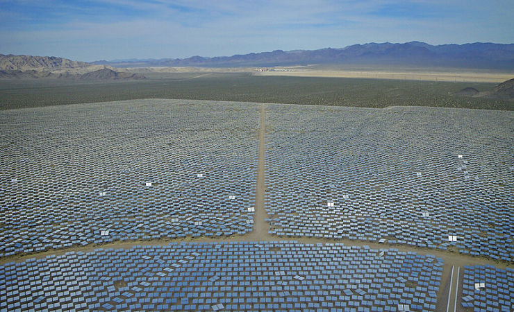 Rows and rows of mirros serving the Ivanpah solar project in the desert