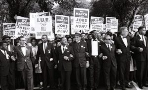 John Lewis and Martin Luther king in 1963 march