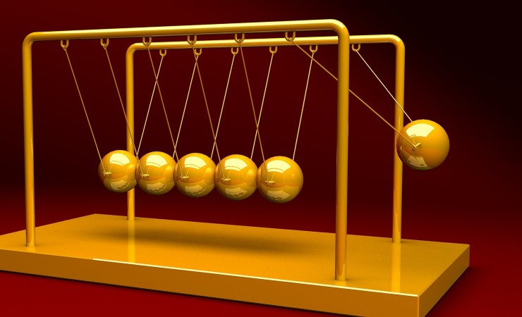 Gold color Newton's Pendulum Cradle with six swinging balls