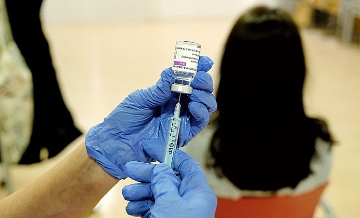 Preparing to inject AstraZeneca vaccine