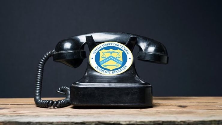 Old-fashioned rotary phone with SIPR logo where dial sits