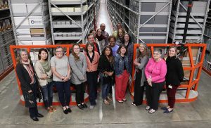 Fellows and staff in library warehouse