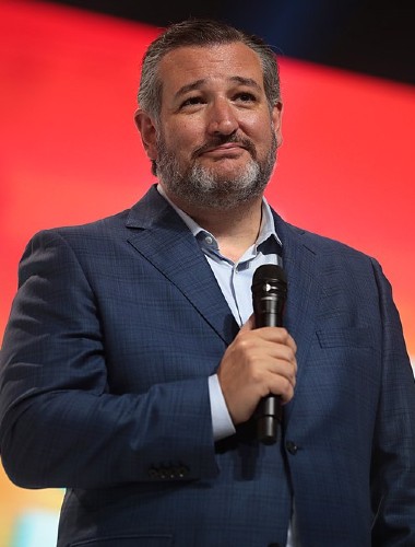 Ted Cruz holding microphone at public event