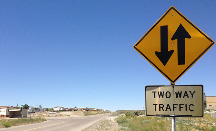 Sign in desert says 'two-way traffic'