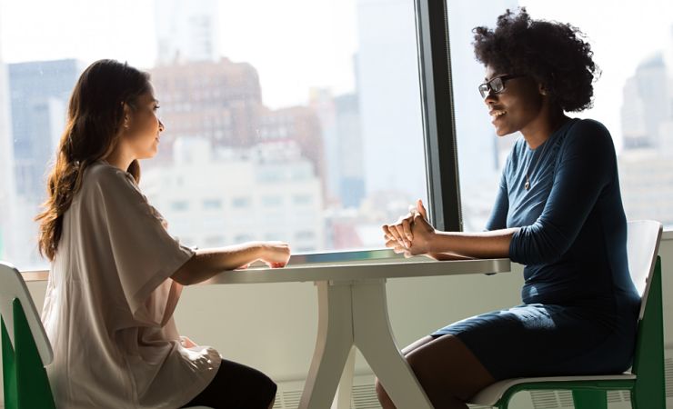 interview at table near window