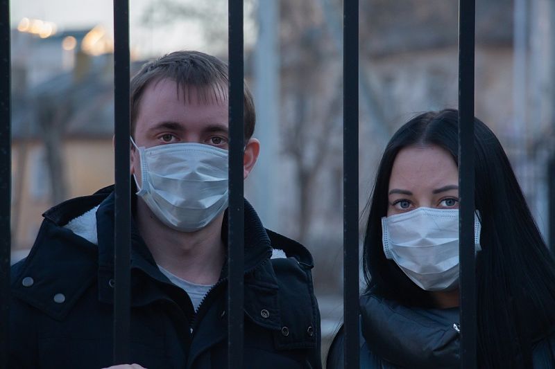 Couple wearing facemasks