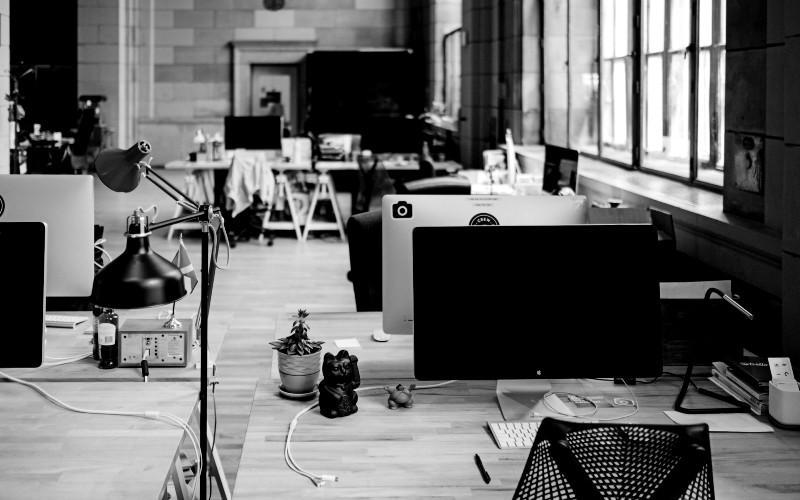 Empty office space rendered in grayscale
