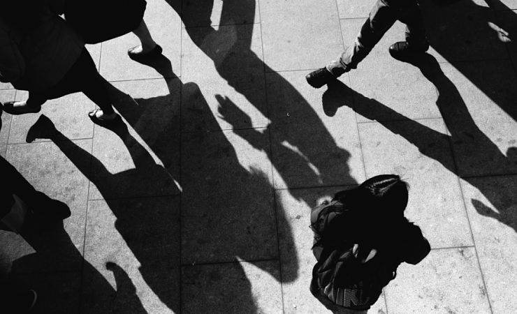 girl surrounded by shadows