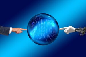 Human hand (left) and robot hand (right) touch a globe with a series of 1's and 0's on it.