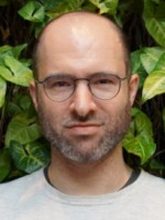 headshot of Ilan Strauss