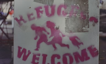 Sign in window that reads 'refugees welcome'