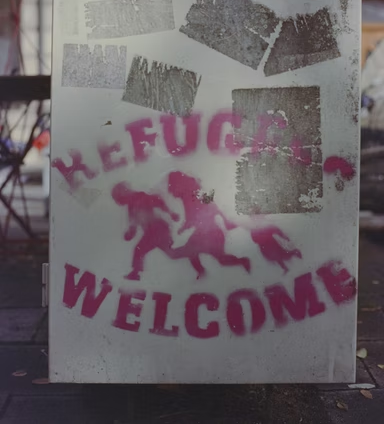 Sign in window that reads 'refugees welcome'