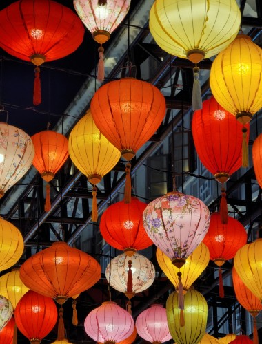 looking up at a vreiety of lanterns marking lunar new year
