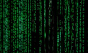 Strings of data in green on computer screen