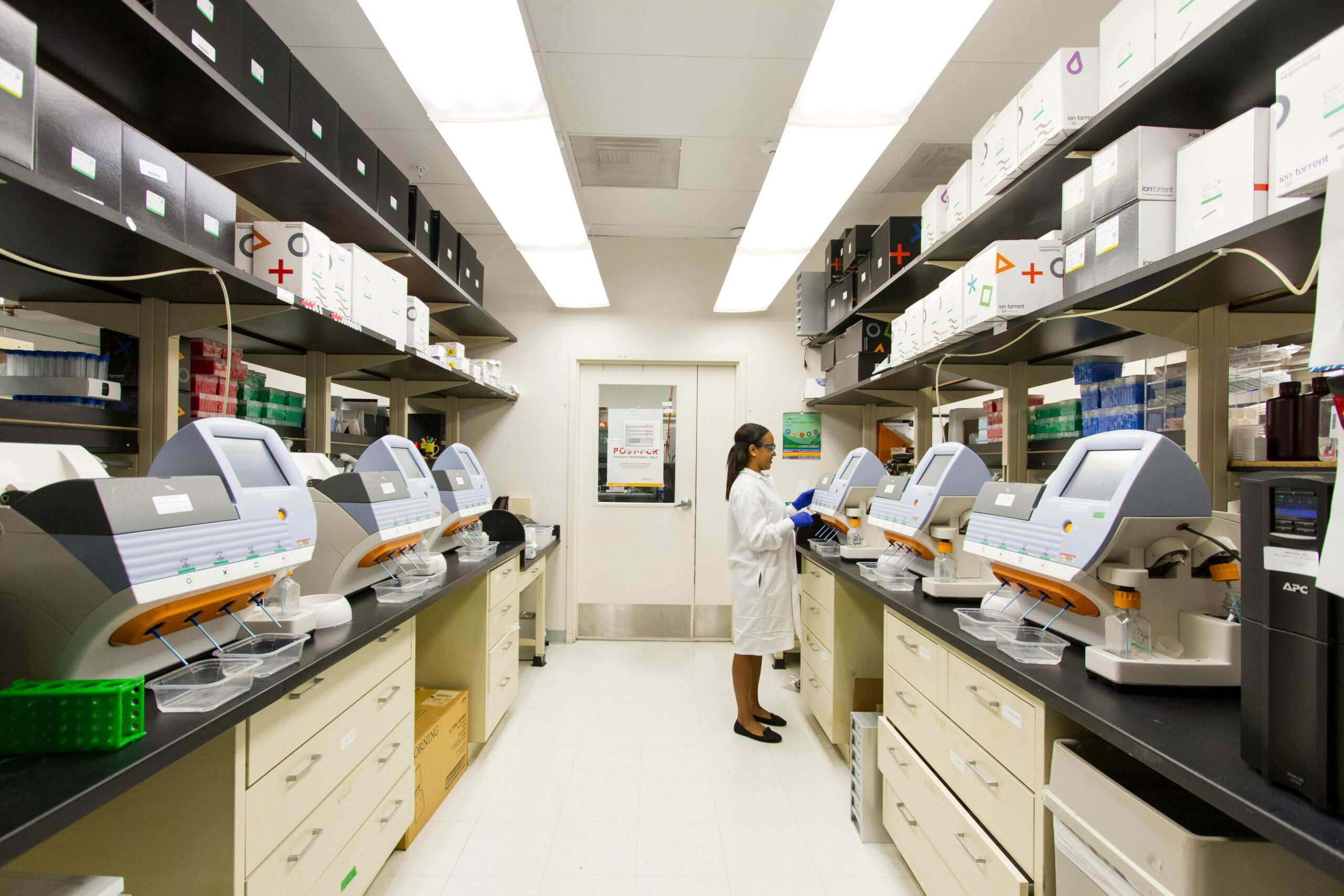 Scientist conducting tests in laboratory.