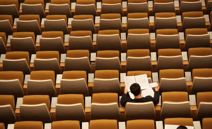 One student in big forum hall