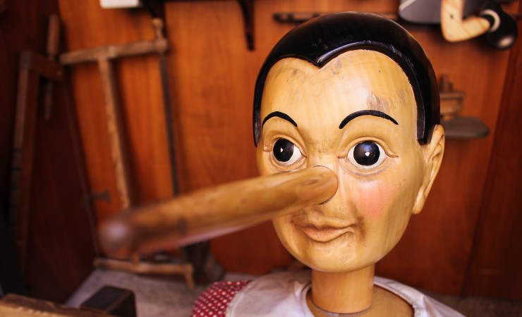 Wooden Pinocchio puppet with long nose