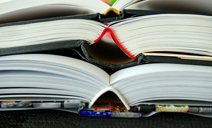 stack of open books