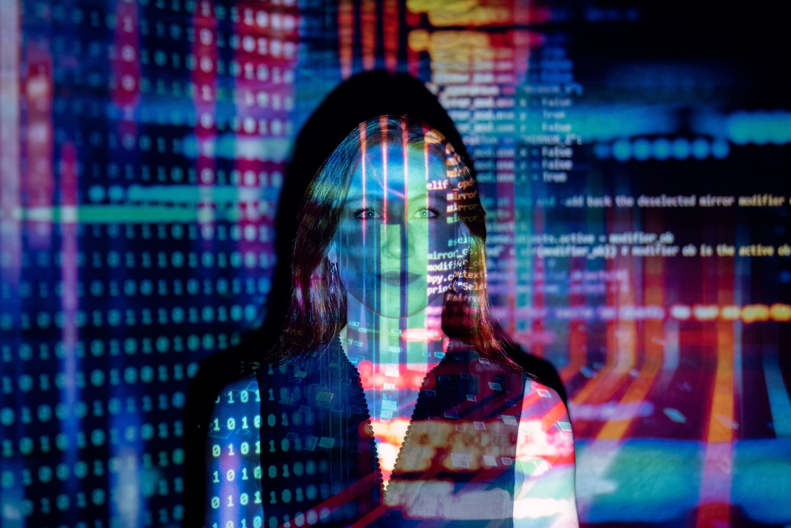 Woman with computer screen images covering her