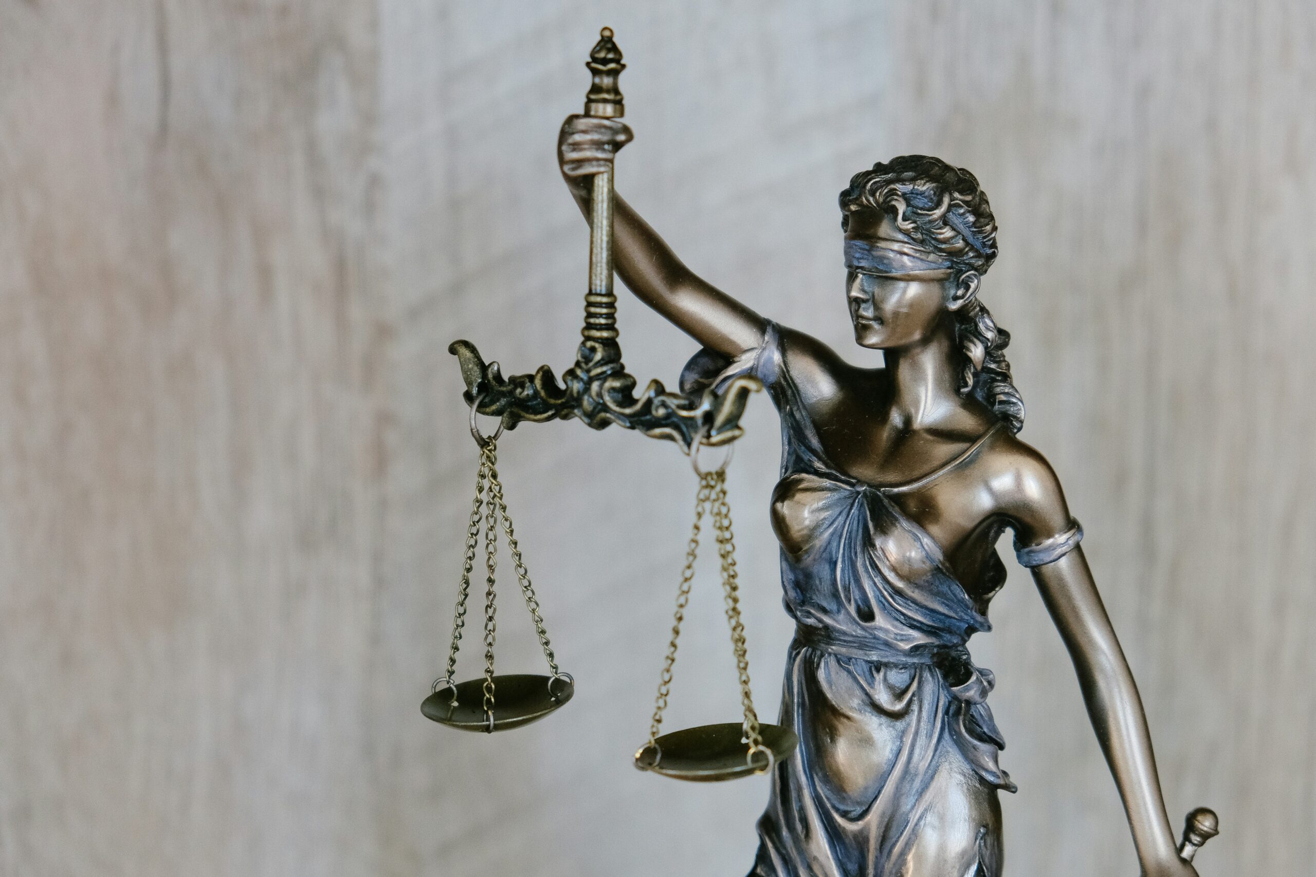 Statue of Lady Justice pictured.