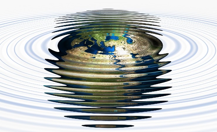 Waves reverberate around image of planet Earth